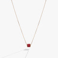 July birthstone pendant featuring a sliding barrel charm with ruby-toned baguette crystals in sterling silver.