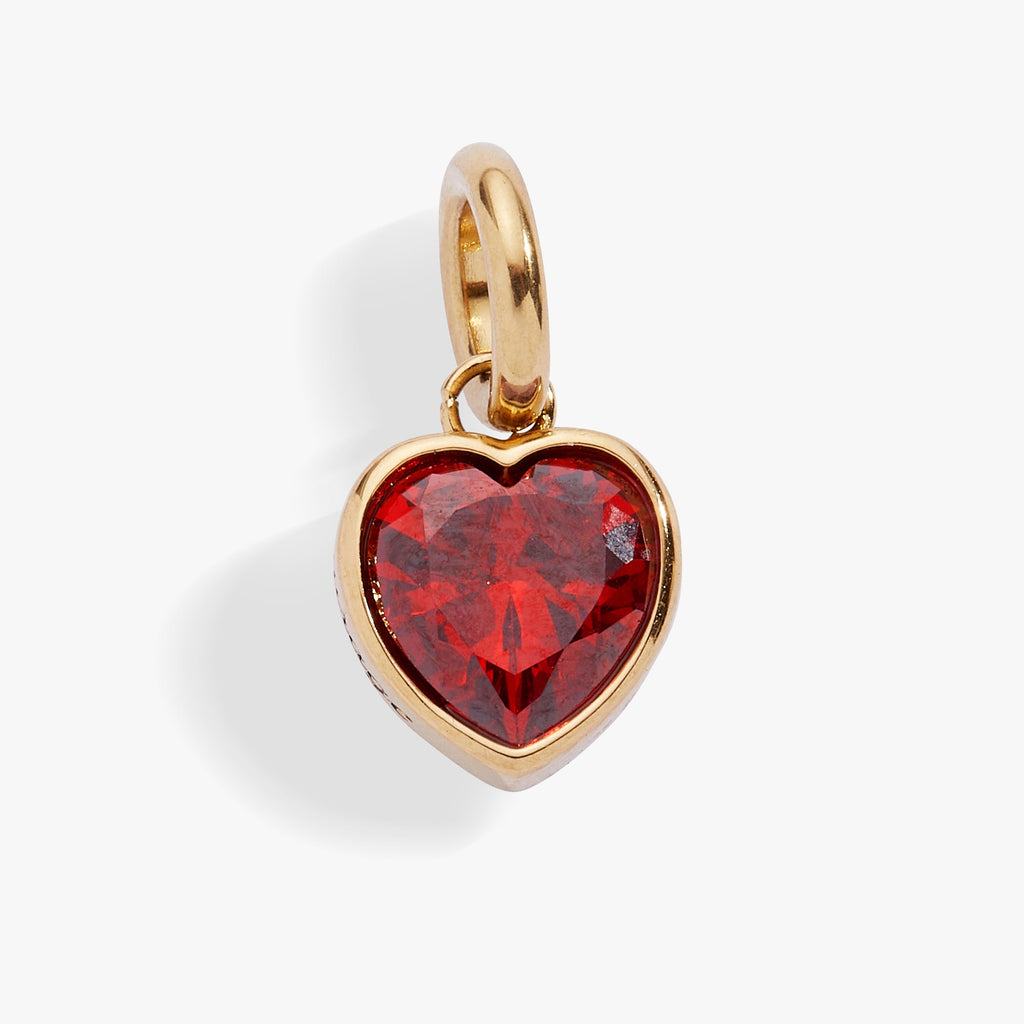July birthstone heart charm featuring a ruby-colored cubic zirconia in a bezel setting with 'Love' engraving.