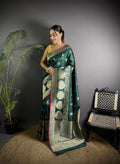 Dark Green Banarasi Soft Lichi Silk Saree featuring elegant paisley patterns