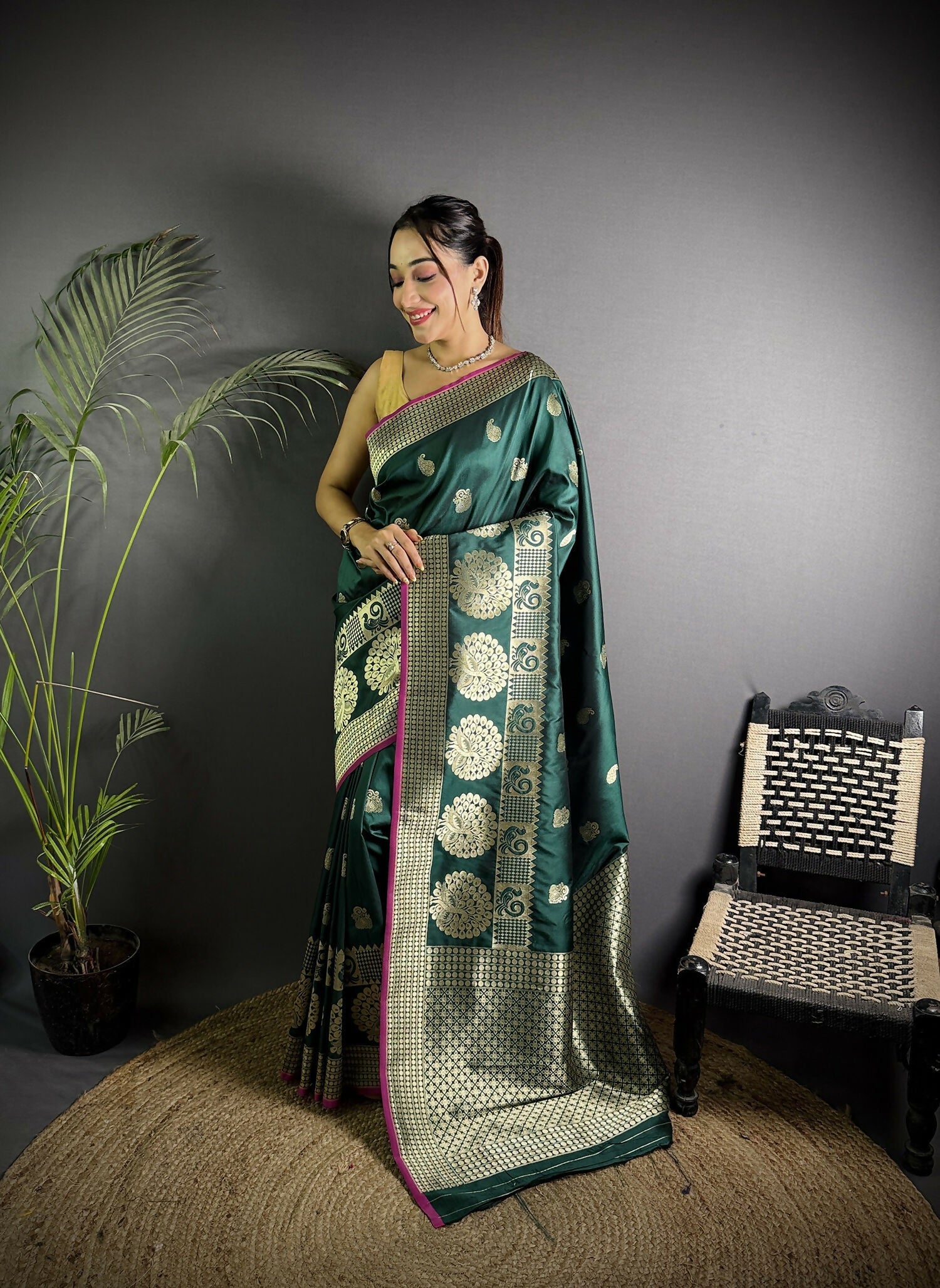 Dark Green Banarasi Soft Lichi Silk Saree featuring elegant paisley patterns