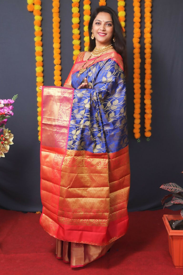 Blue Kanjivaram Silk Saree with Contrast Red Blouse and Zari Work