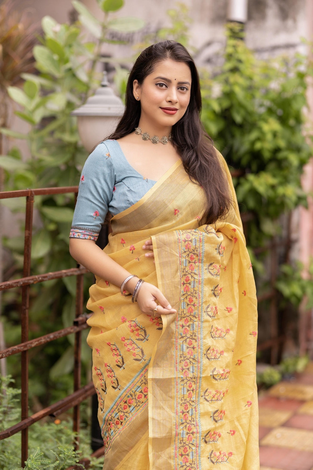 Yellow Pure Linen Saree with Ethnic Motifs and Embroidered Blouse