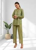 Green silk readymade cord set with intricate embroidery and collared top