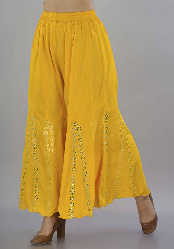 Bright yellow wide-leg palazzo pants with intricate mirror flower embroidery