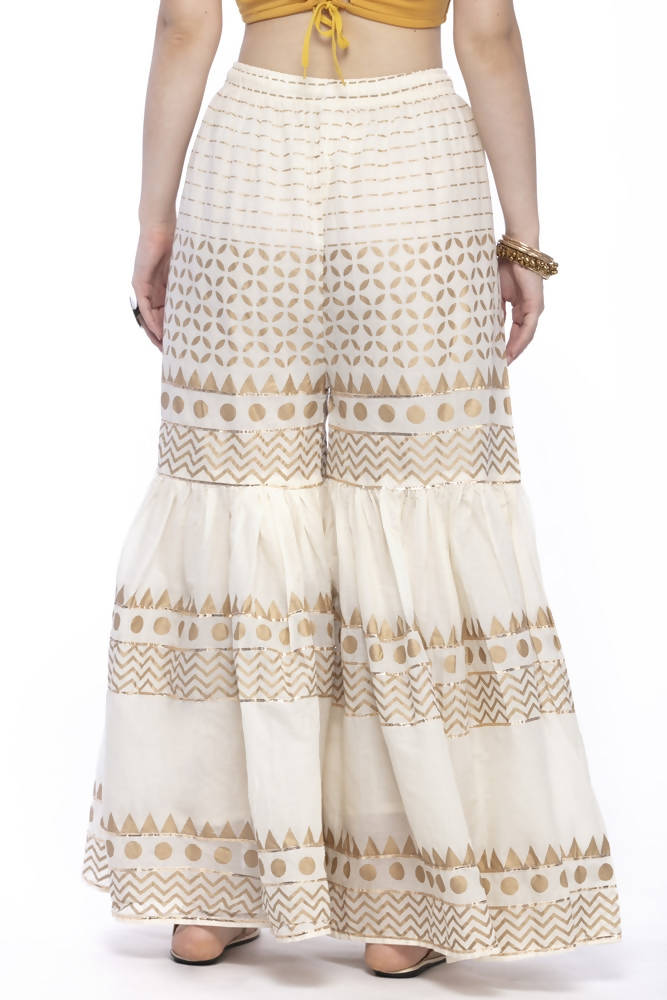Off White cotton sharara featuring Gold print and Gota detailing