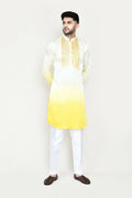 Elegant yellow satin silk kurta with matching straight-leg trousers.