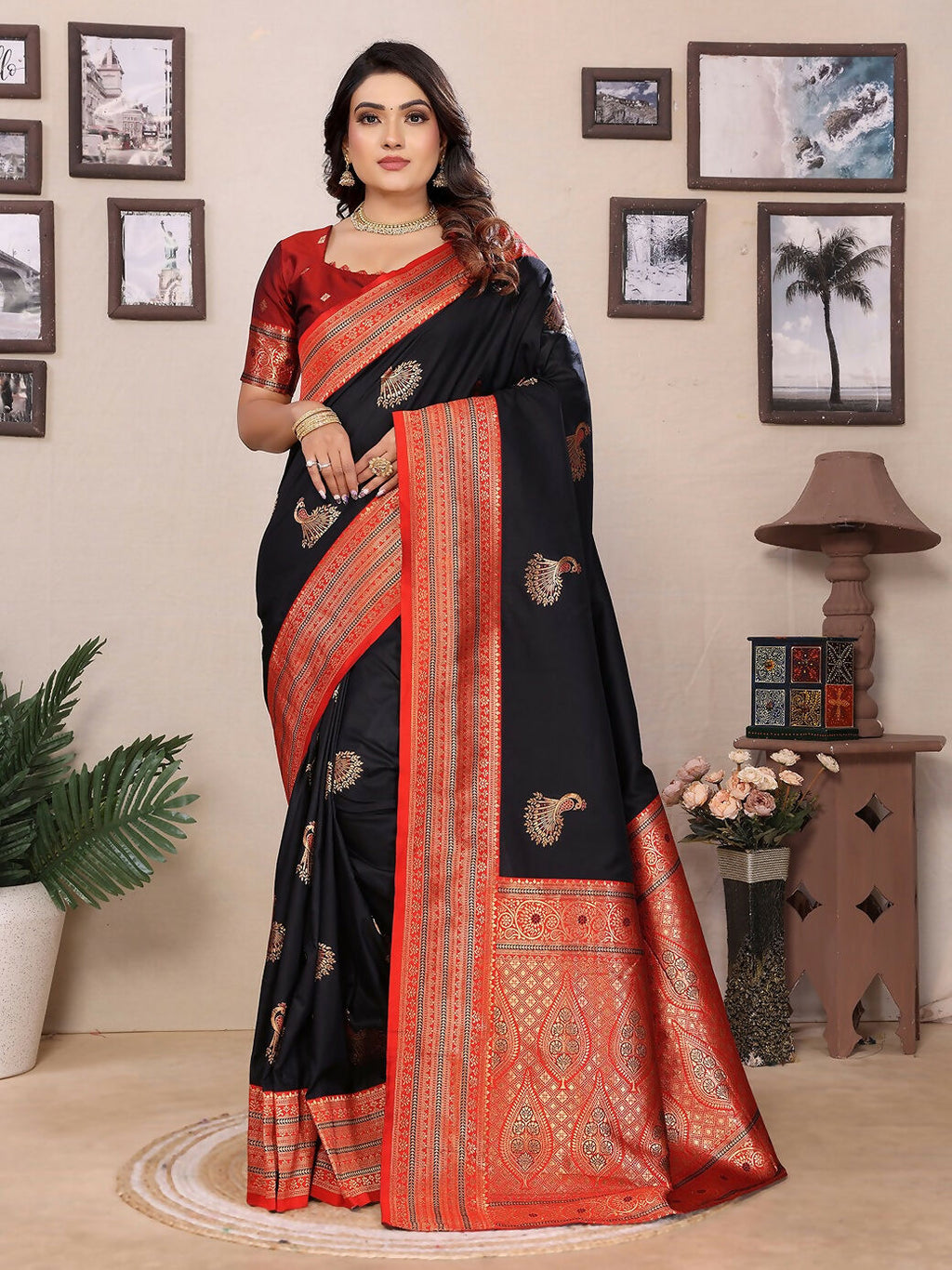 Elegant black Banarasi soft silk saree with gold small butti motifs and matching blouse piece