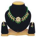 Green Kundan necklace set featuring gold-plated alloy and adjustable cord