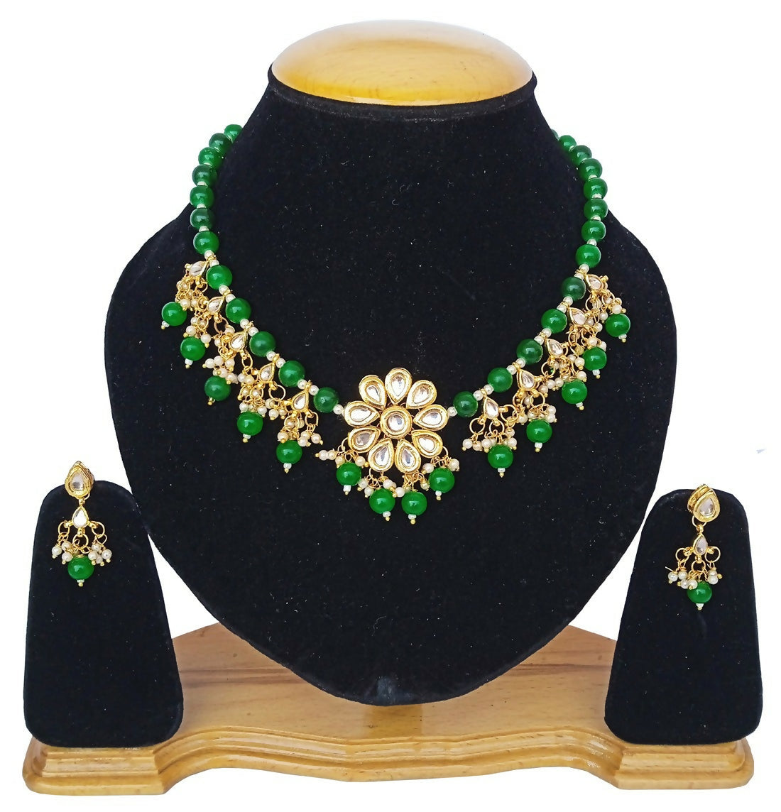 Green Kundan necklace set featuring gold-plated alloy and adjustable cord