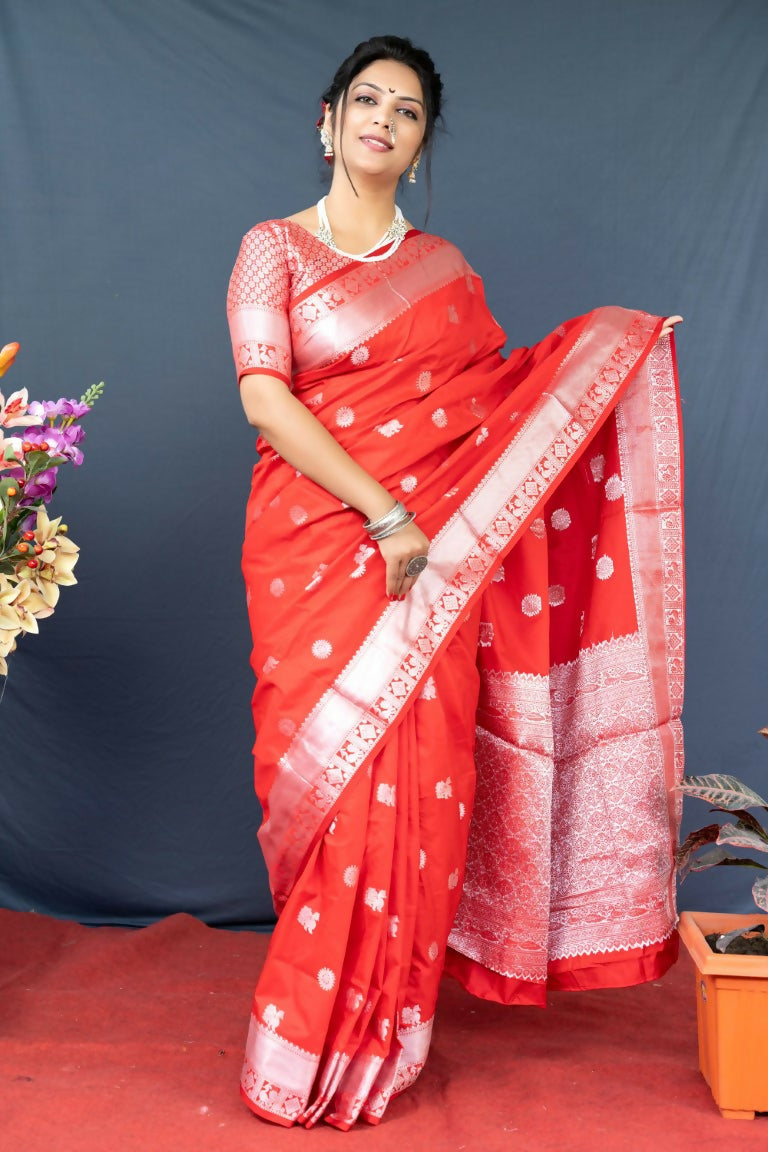 Monochromatic red soft Banarasi silk saree with traditional zari woven border