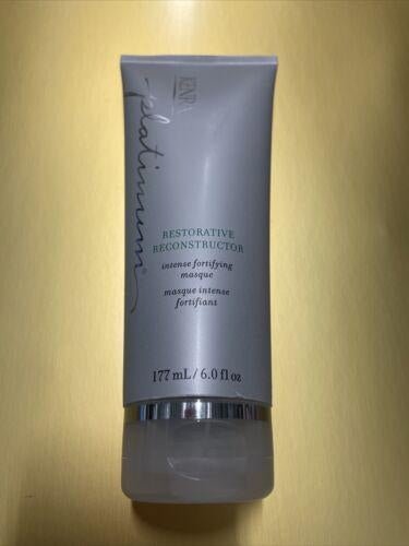 6 oz bottle of Kenra Platinum Restorative Reconstructor for damaged hair repair