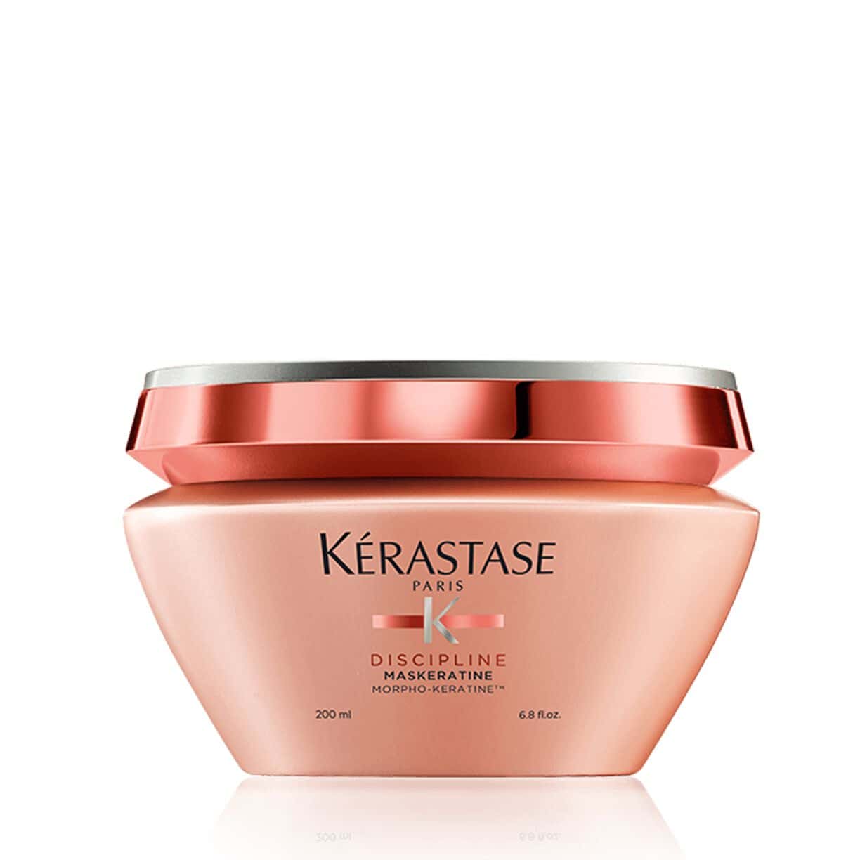 Container of Kérastase Discipline Maskeratine hair mask in rose-gold and silver packaging.