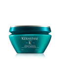 Kérastase Resistance Masque Therapiste in a teal and silver jar