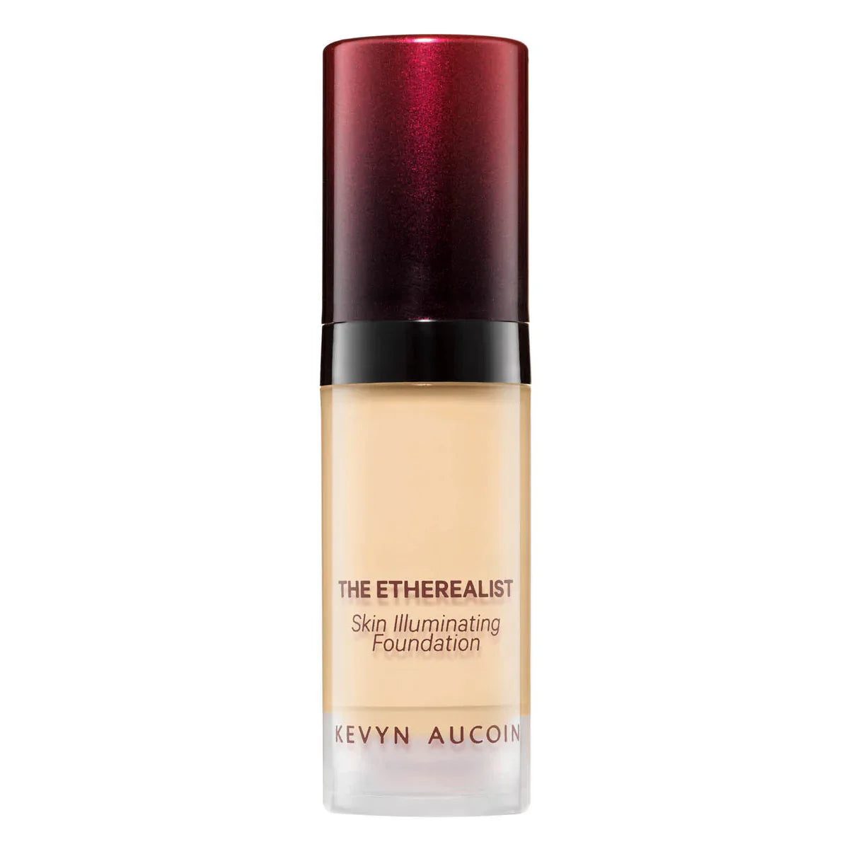 Mini Etherealist Skin Illuminating Foundation bottle with deep-red metallic cap and pump dispenser.