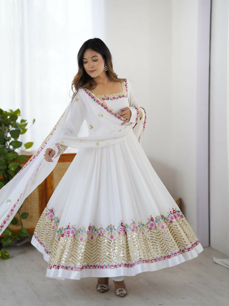 Elegant white georgette kurta set featuring shimmering sequence embroidery work.