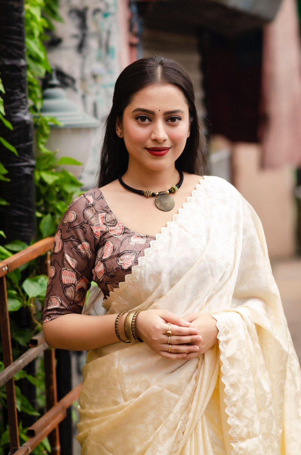 Cream Poly Silk Saree with Ethnic Mango Motifs and Cutwork Border