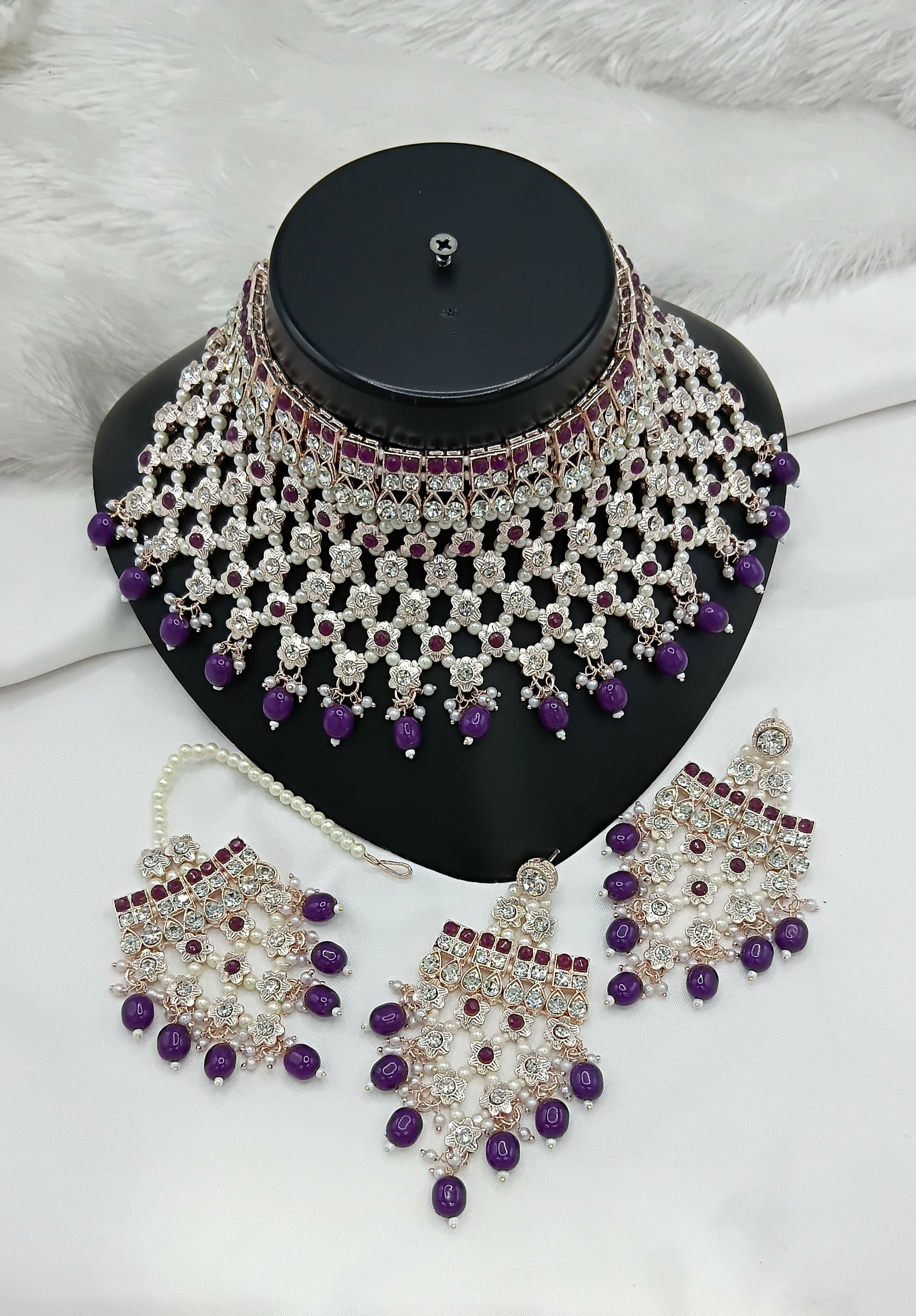 Purple stone and pearl work necklace set with traditional earrings and tikka