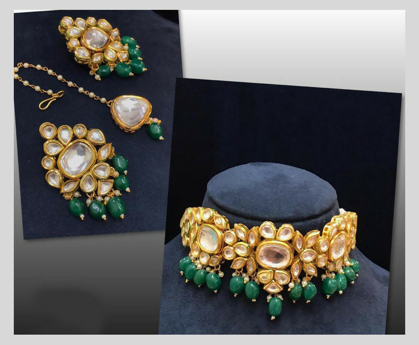 Green Kundan stone necklace set with gold plating and adjustable cord