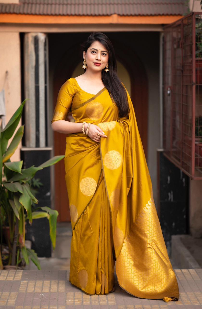 Mustard silk saree with gold zari woven butta detail and matching unstitched blouse