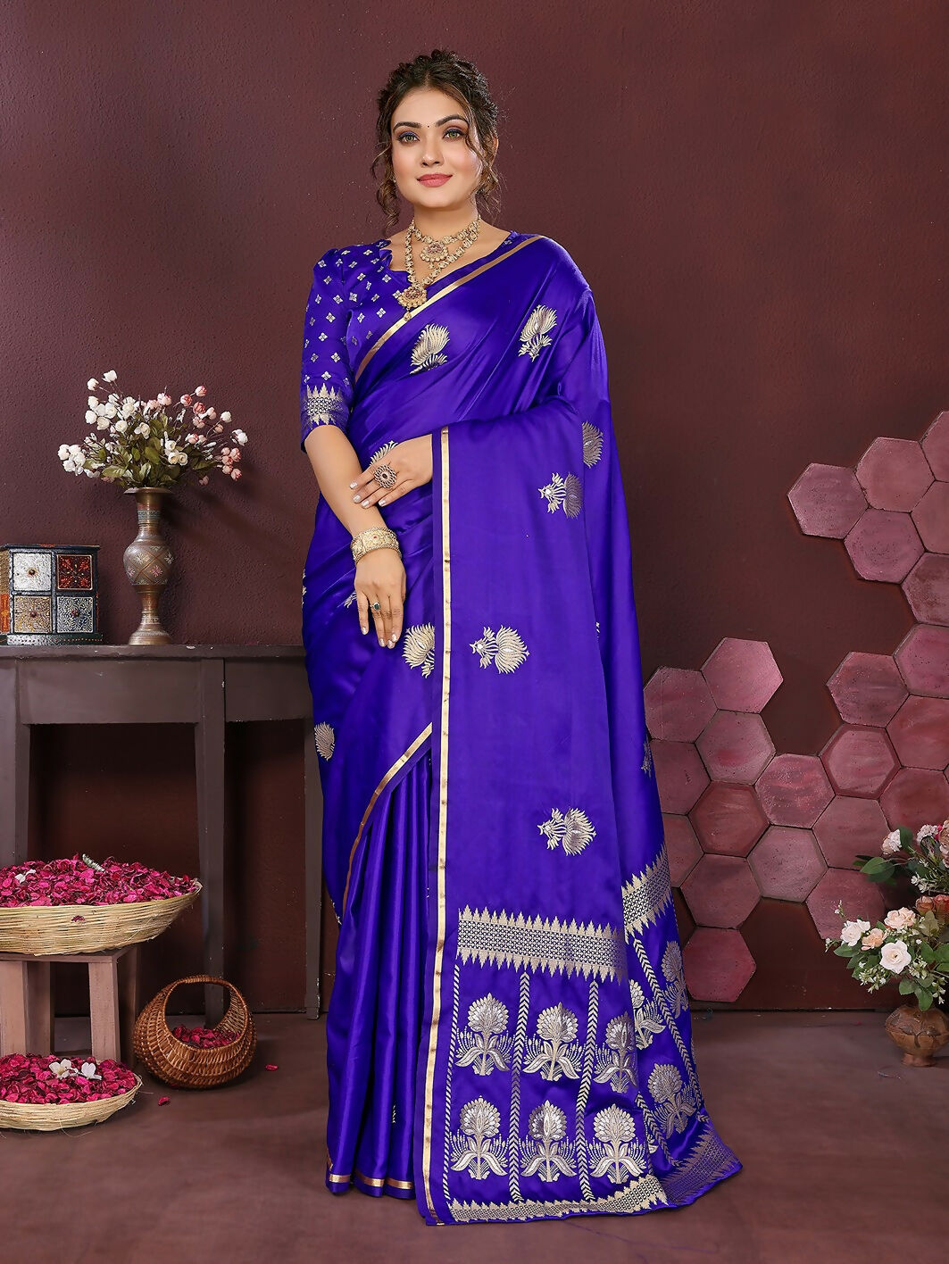 Royal blue floral print Banarasi satin silk saree with matching unstitched blouse.