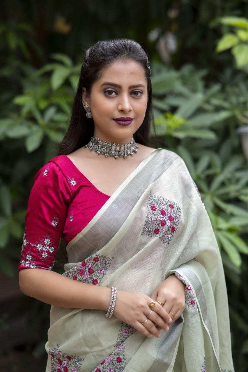Green Pure Linen Saree with Ethnic Motifs and Zari Border