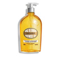 L'Occitane Almond Shower Oil bottle in gold and amber packaging