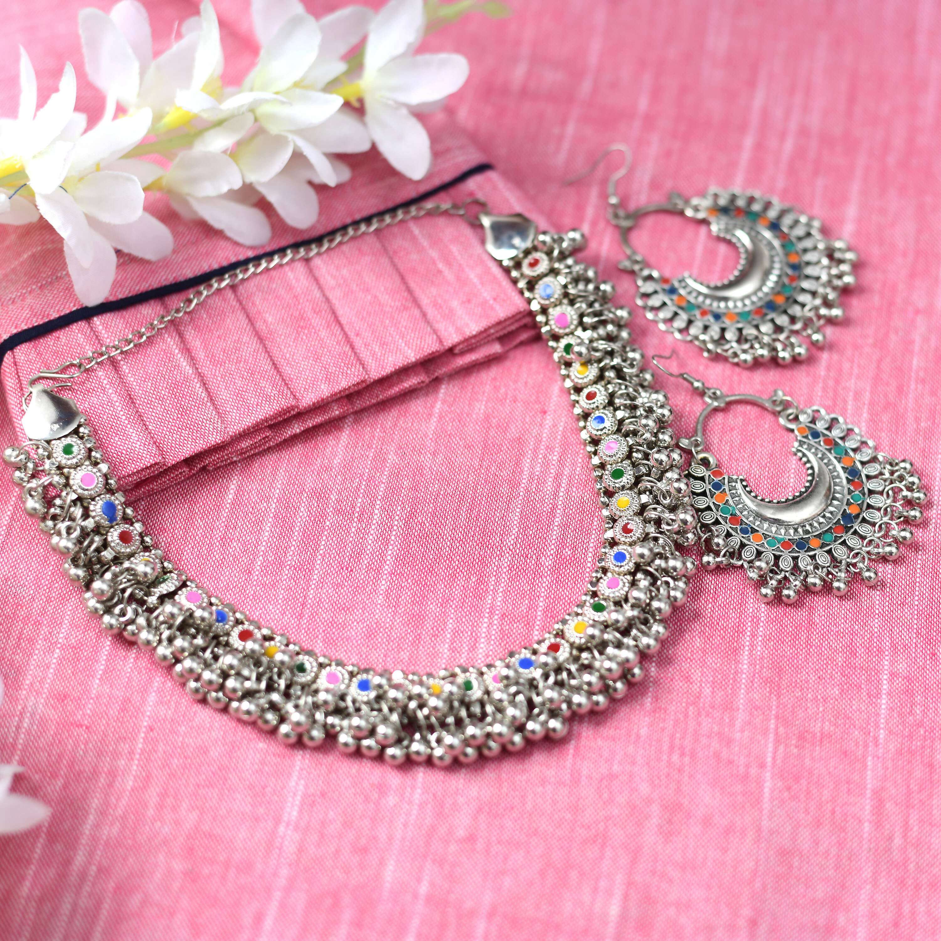 Oxidised silver-plated brass choker set with vibrant Meena work