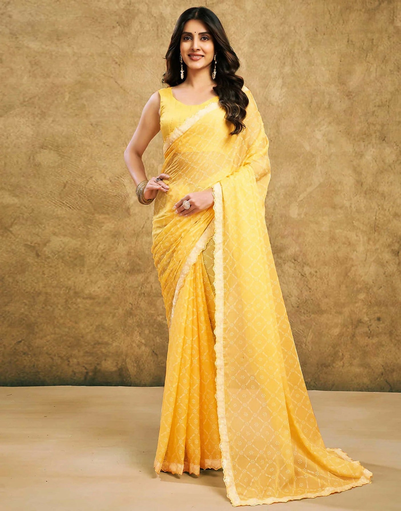 Light yellow and white printed chiffon saree with elegant lace border detail
