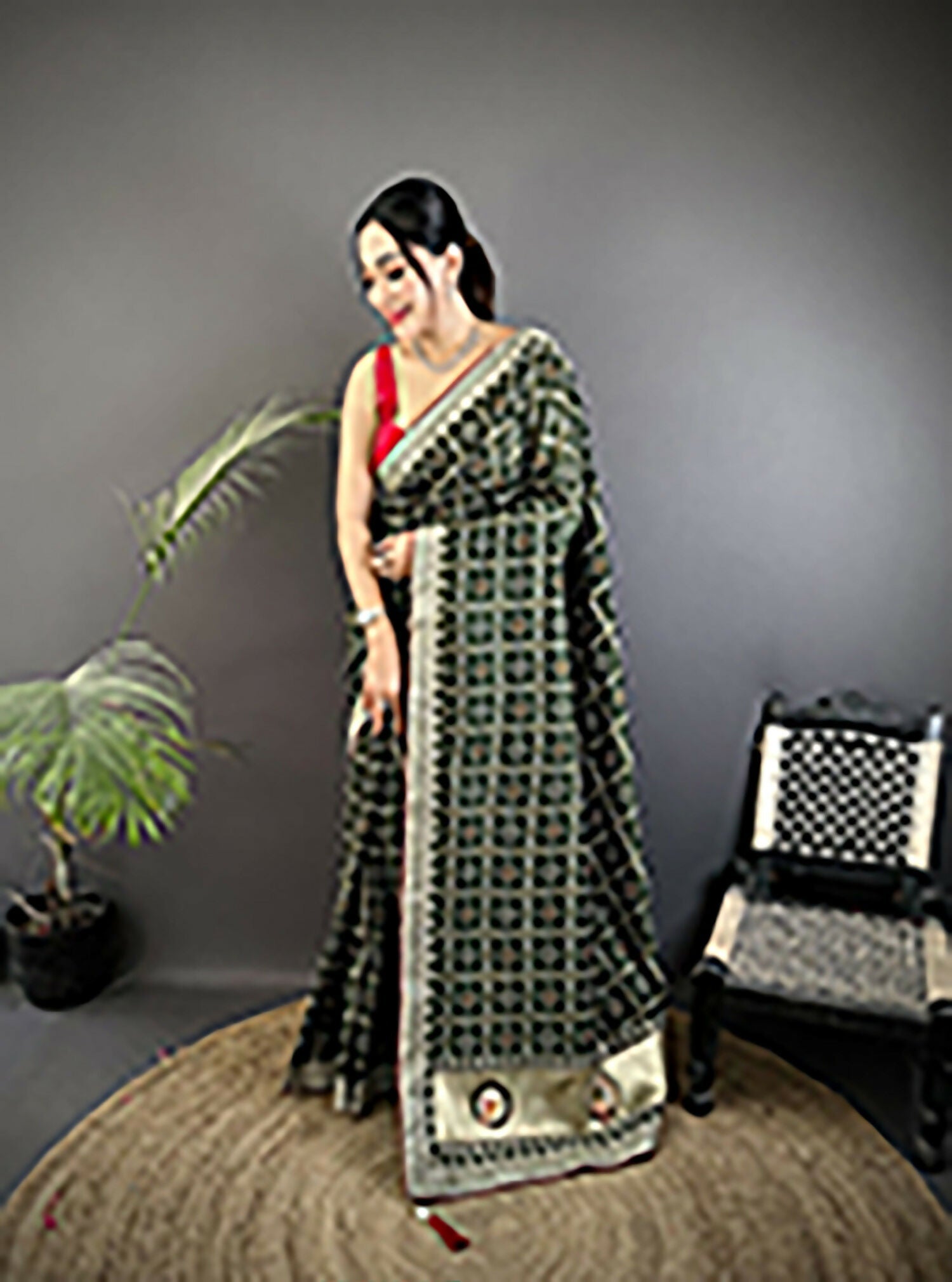 Dark Green Vichitra Silk saree featuring traditional Bandhani prints.