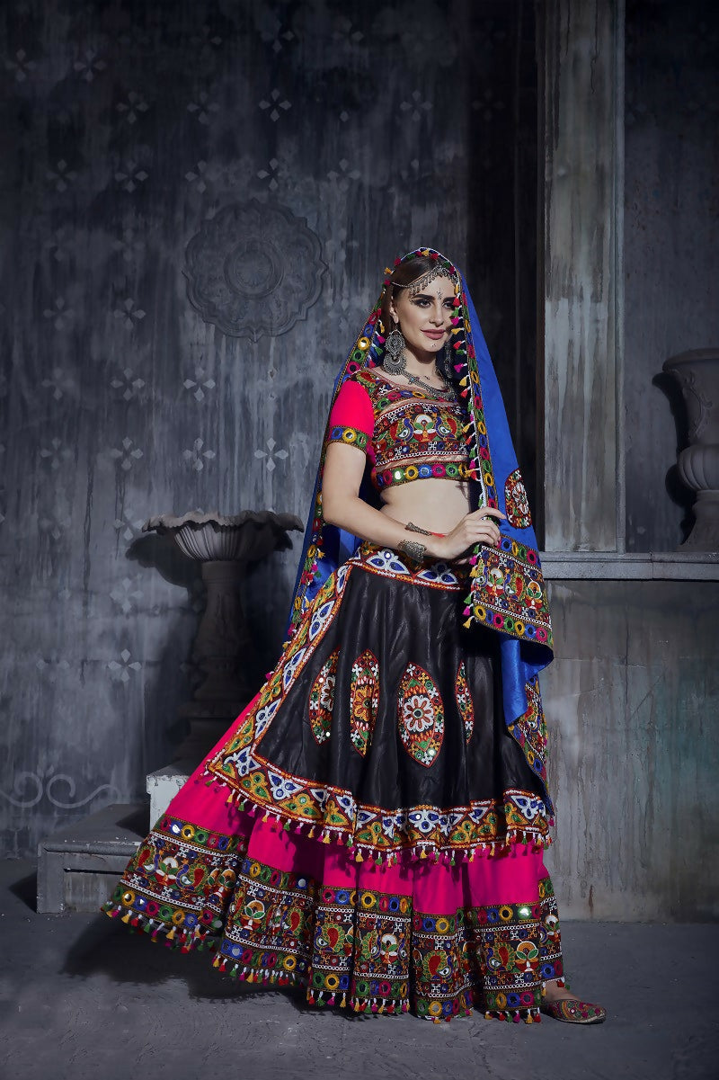 Multi-colored art silk designer lehenga choli with blue dupatta.