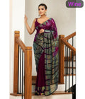 Wine colored georgette saree heavily embellished with sequins and paired with a Banglori silk blouse.