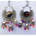 Afghani-style triple-tier silver oxidized jhumka earrings with multi-color pearl detailing.