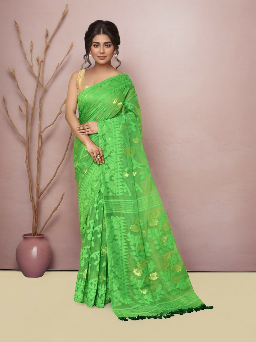 A traditional green cotton blend Jamdani saree for women