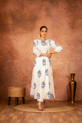 Woman wearing a blue floral hand block printed cotton kurta with matching pants