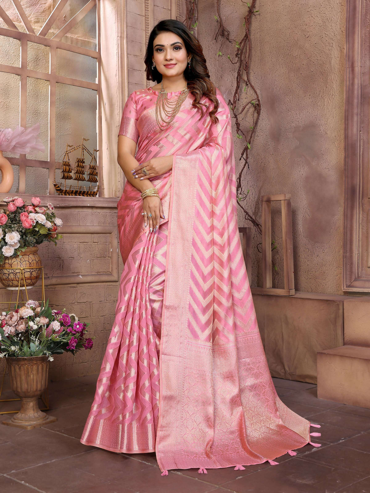 Beautiful pink soft organza silk saree with detailed weaving