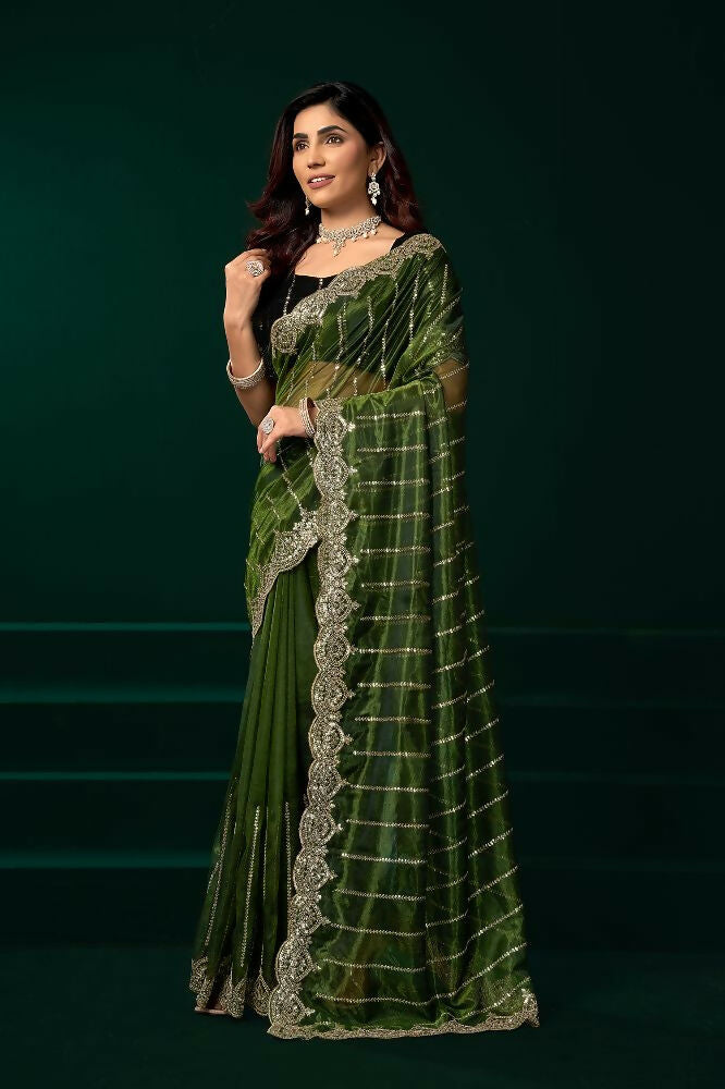 Green Net Party Wear Saree with Black Velvet Blouse