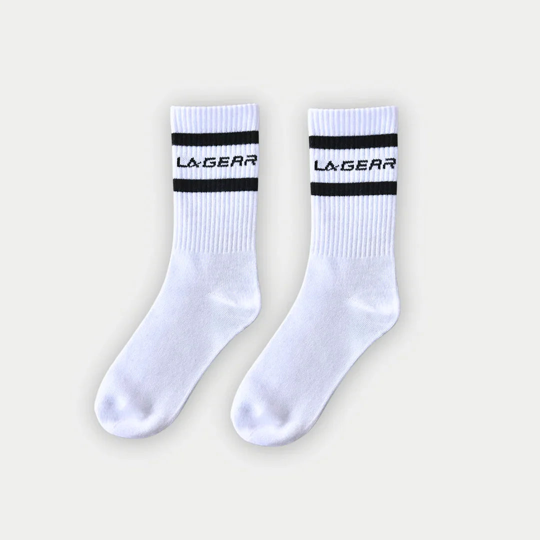 White LA Gear crew socks with classic athletic stripes and brand logo