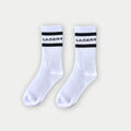 White LA Gear crew socks with classic athletic stripes and brand logo