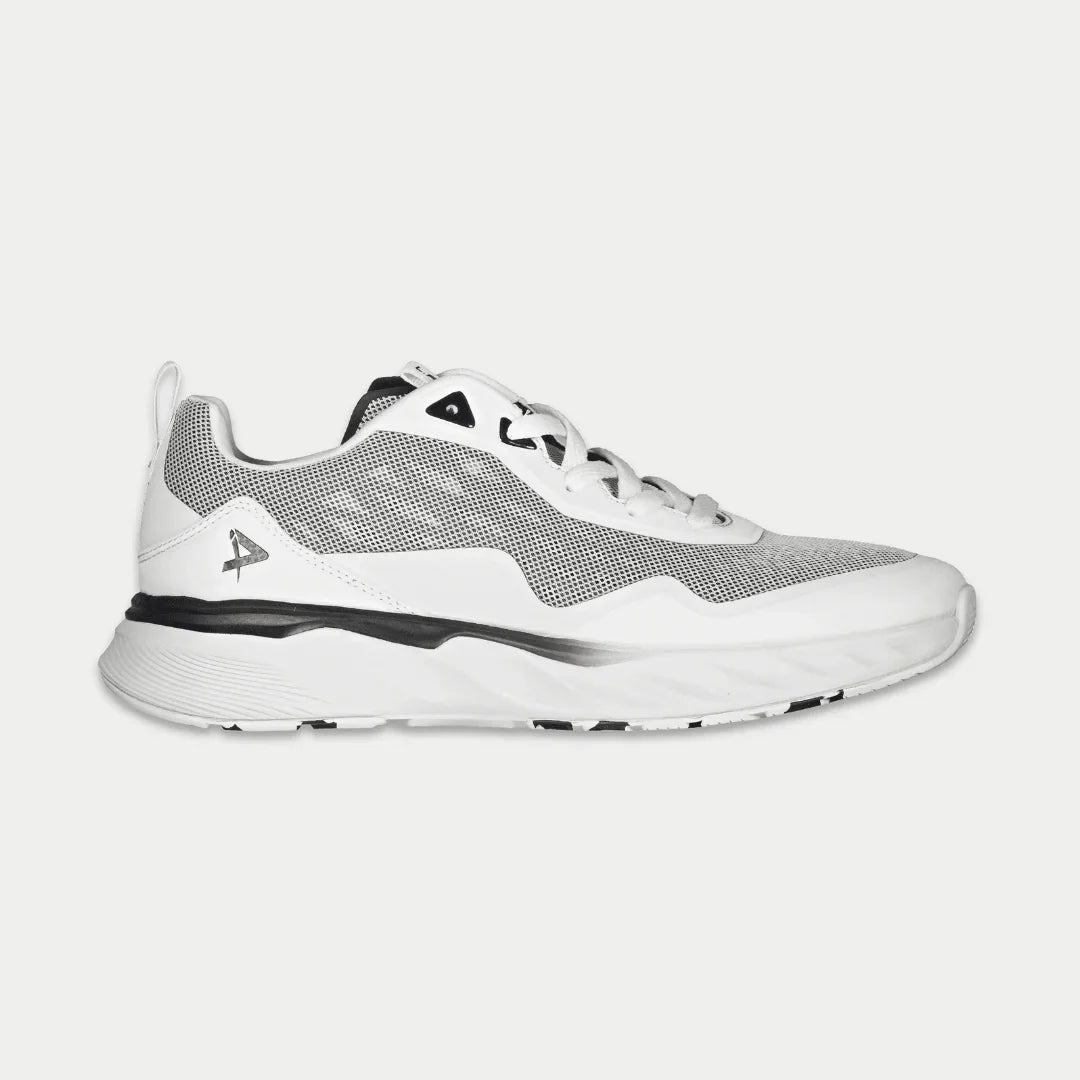 LA Gear Highland lowtop sneakers in a white and black colorway, featuring breathable mesh and perforated details.