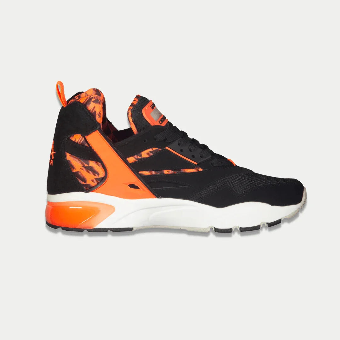 LA Gear Turbo mid-top sneakers in black and neon red with light-up detailing