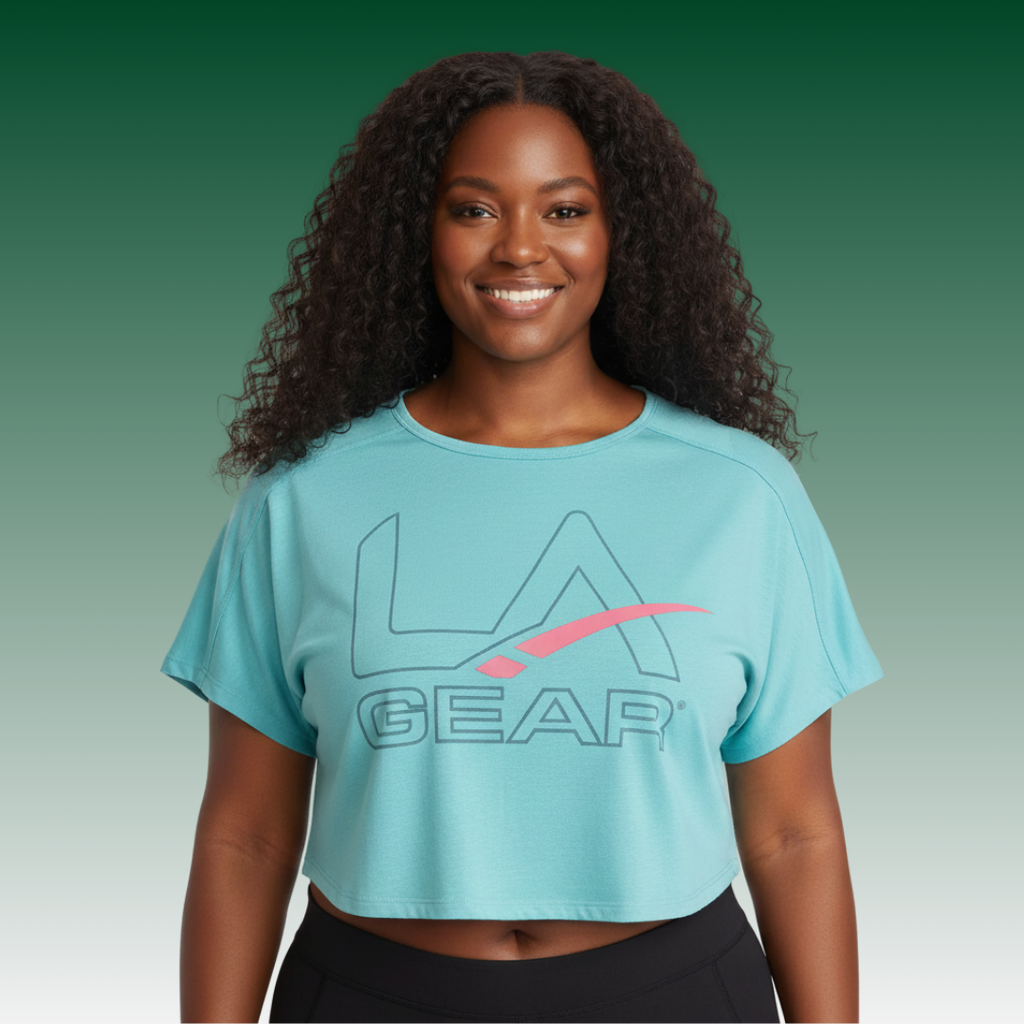 LA Gear light aqua cropped tee with retro slate and pink logo on a model