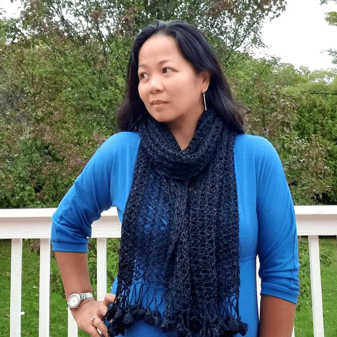 Finished Lacy Floret Shawl featuring delicate crochet flower details on the ends.