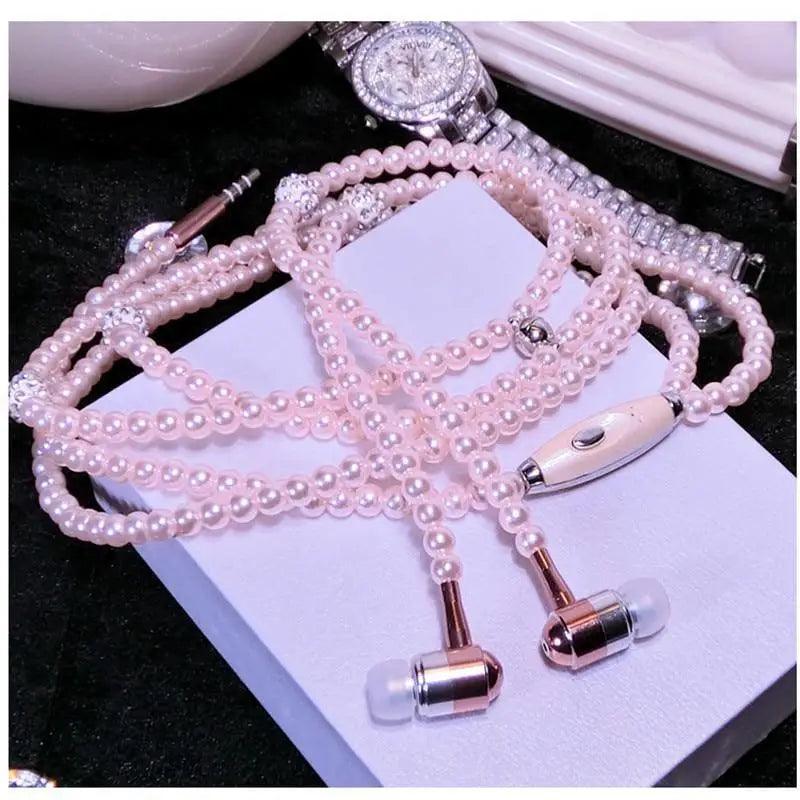 Elegant simulated pearl necklace with integrated earphones and microphone for a luxury tech look.