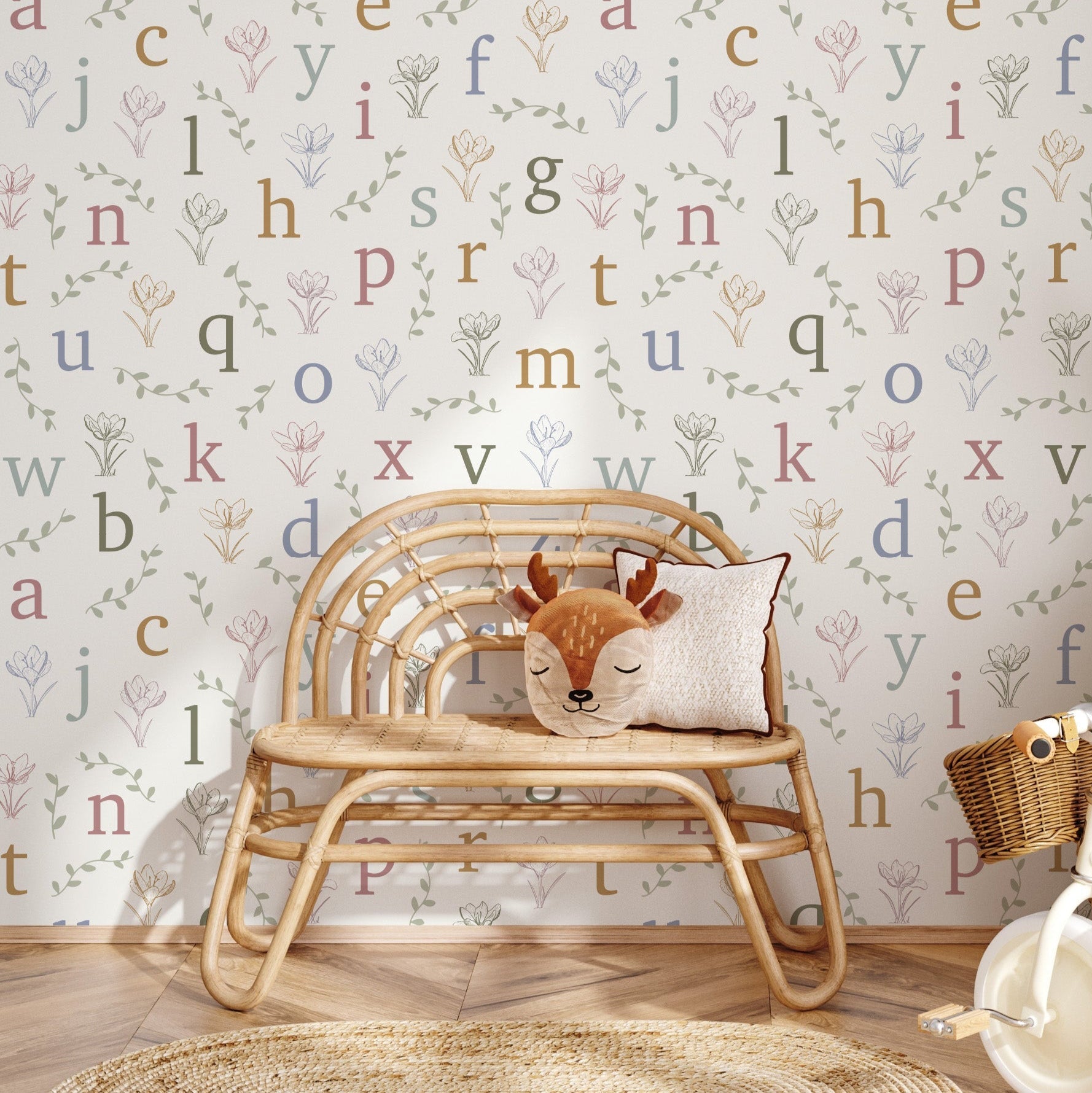 Whimsical Lenny wallpaper in off-white and muted-multicolor patterns for a nursery