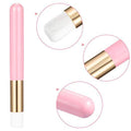 Pastel pink and gold lash shampoo and nose pore cleaning brush set on a clean minimalist surface