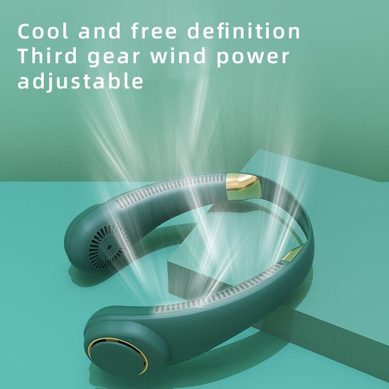 A minimalist matte dark-green leafless neck fan with gold accents worn by a person, styled in tech-wear aesthetic.