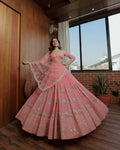 A designer baby pink lehenga choli set with 5MM sequins and zari embroidery in faux georgette fabric.