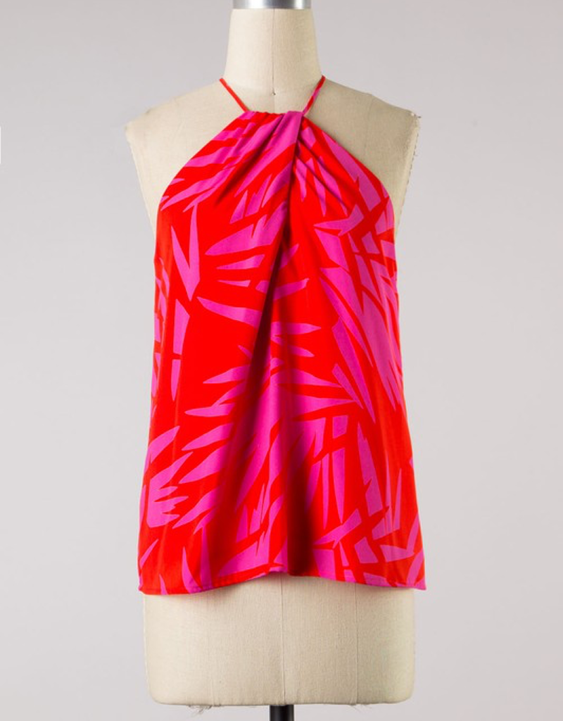 Model wearing a stylish Leaf Print Halter Neck sleeveless top