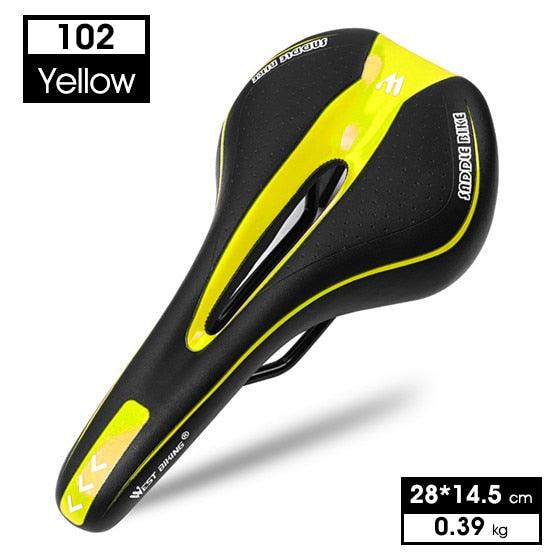 Ergonomic black and yellow bicycle saddle with air-guide grooves on a white background