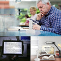 Portable and compact white LED desk lamp designed for reading and student study.